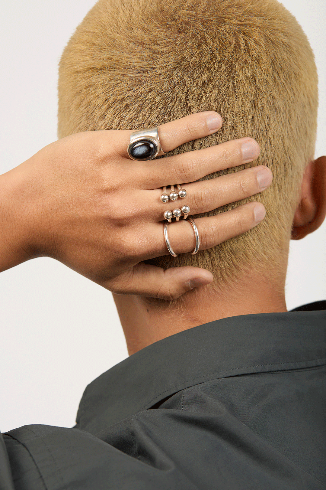 Man wearing sterling silver rings from Annabel B
