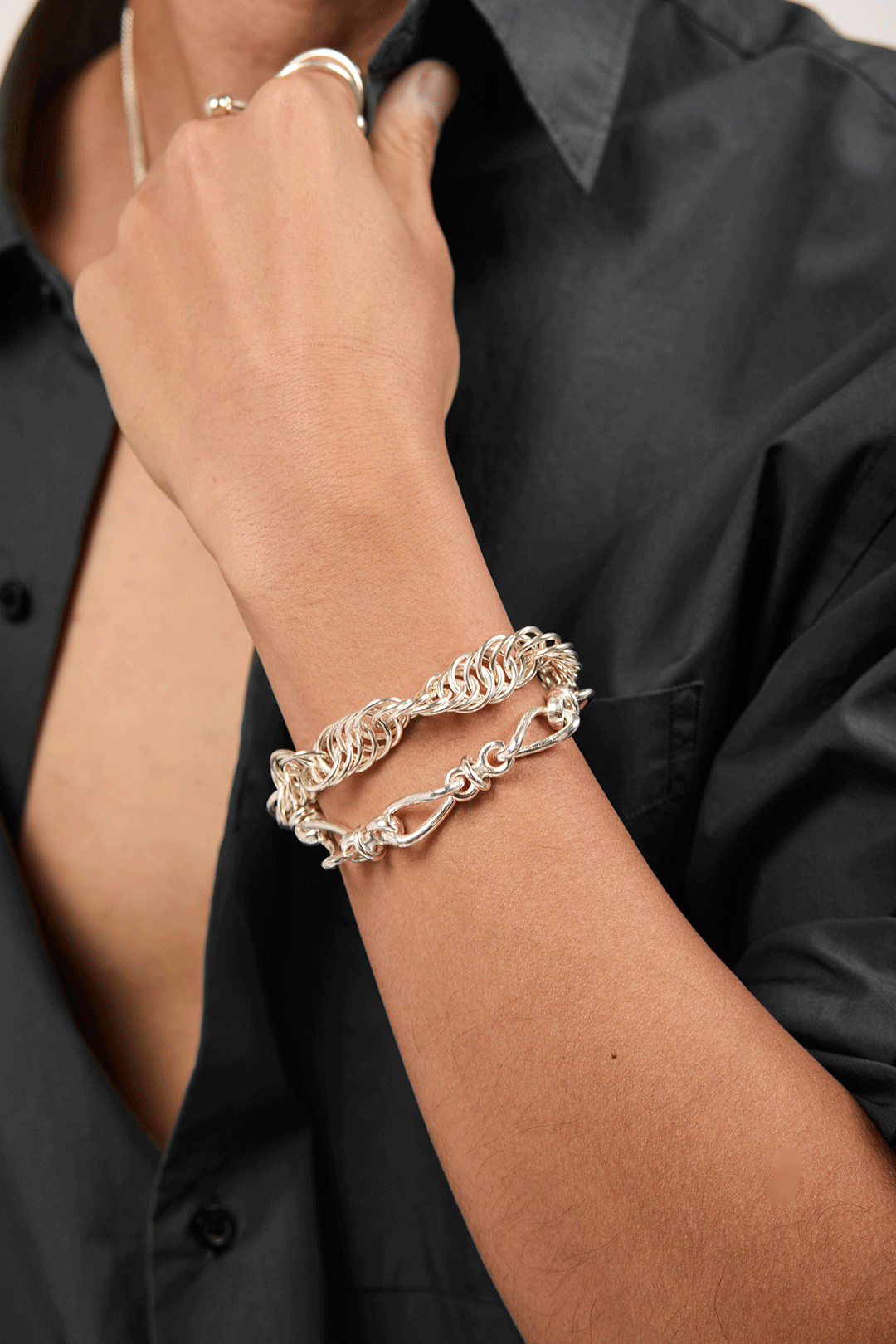 Model wearing Loops Bracelet in silver