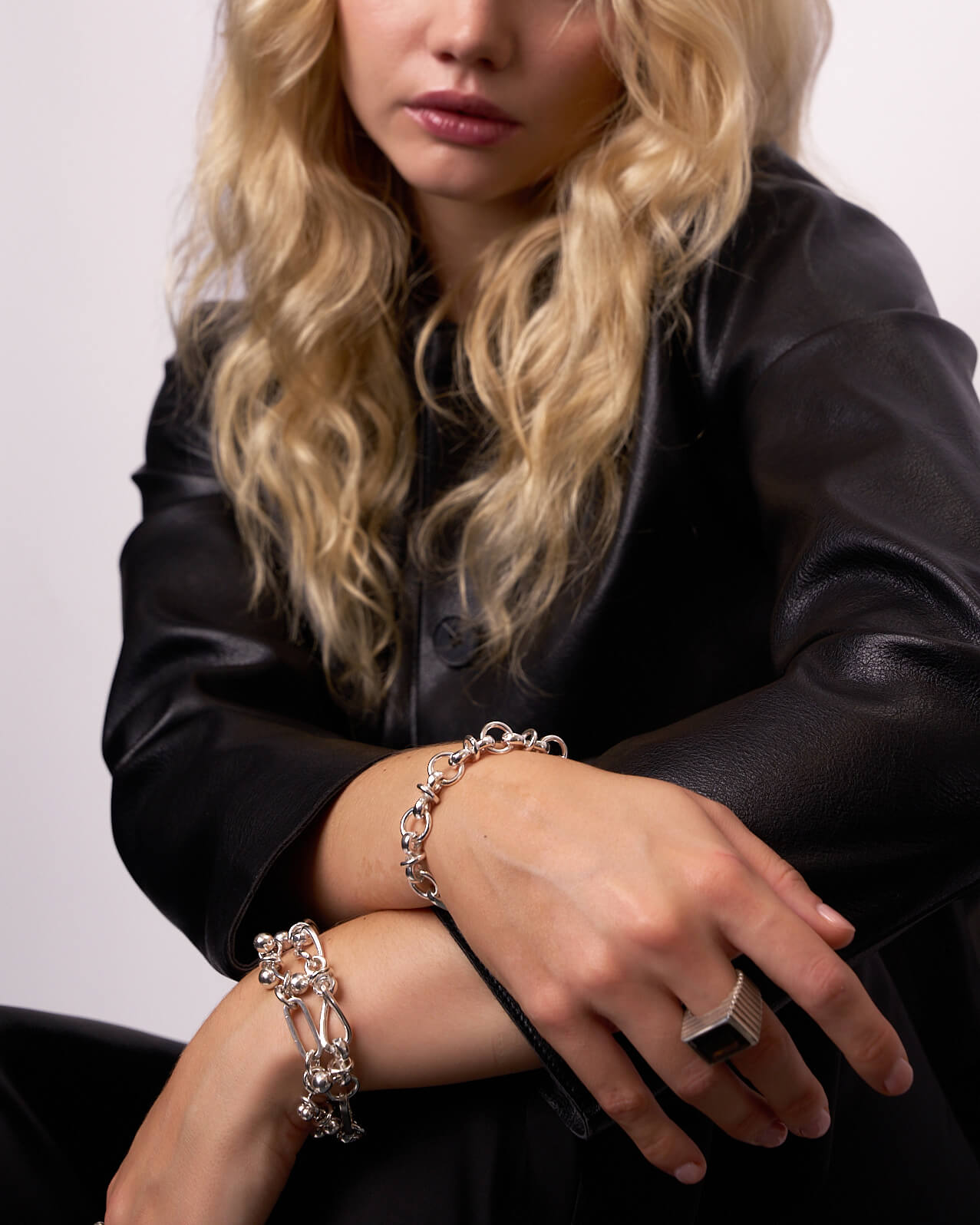 Stacked sterling silver bracelets by Annabel B