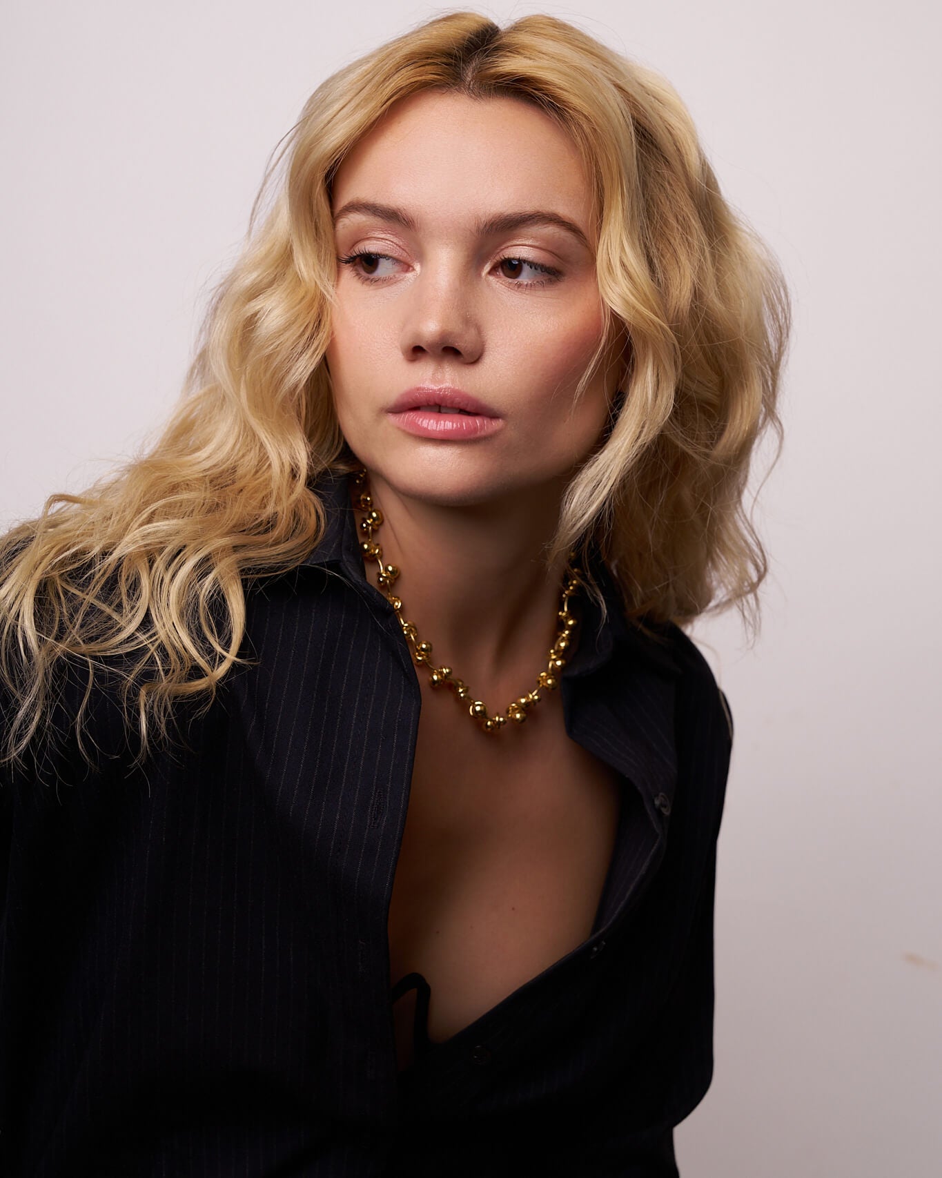 Model wearing the 43cm BarBell Necklace in gold