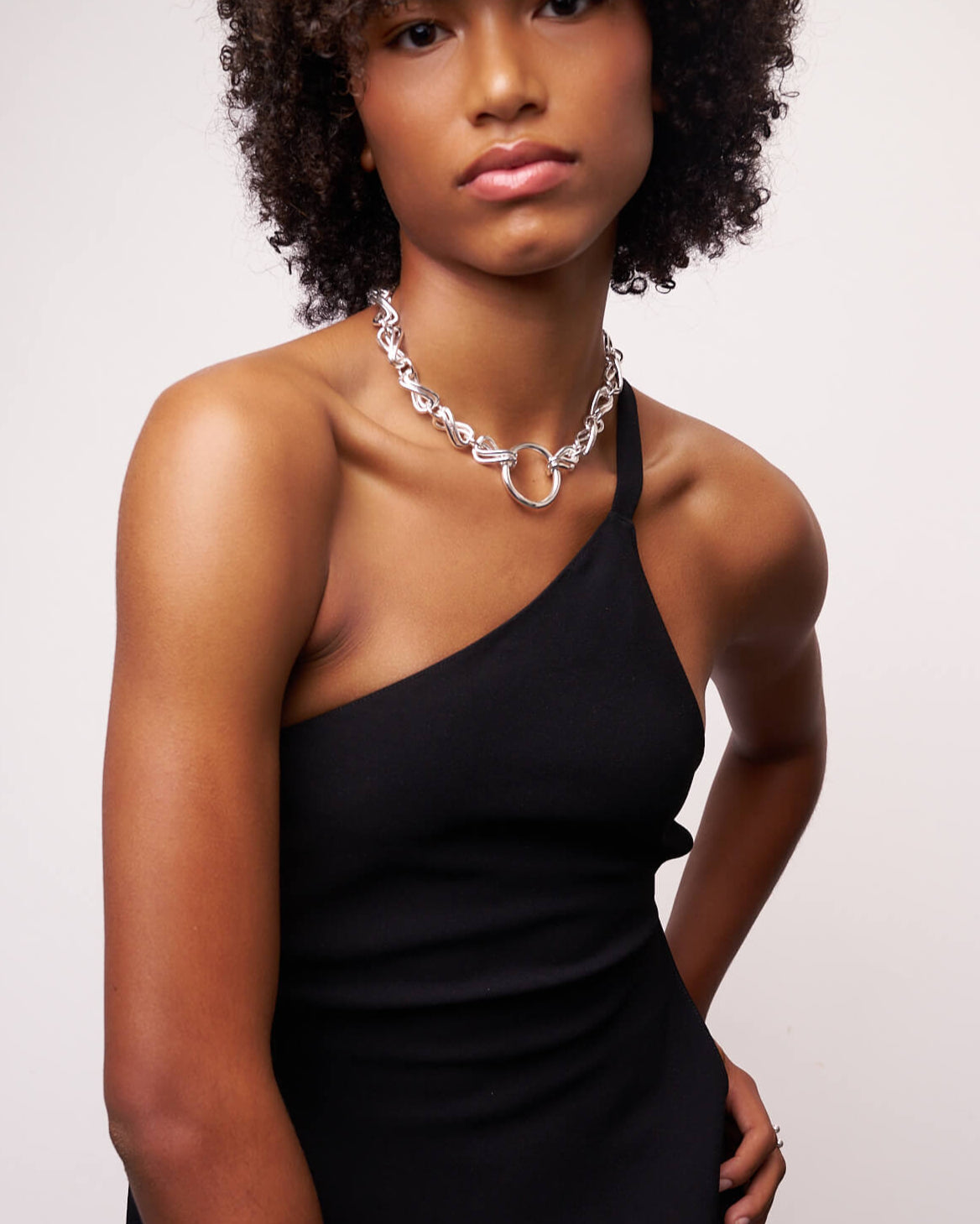 Model wearing the Double Infinity Necklace in sterling silver