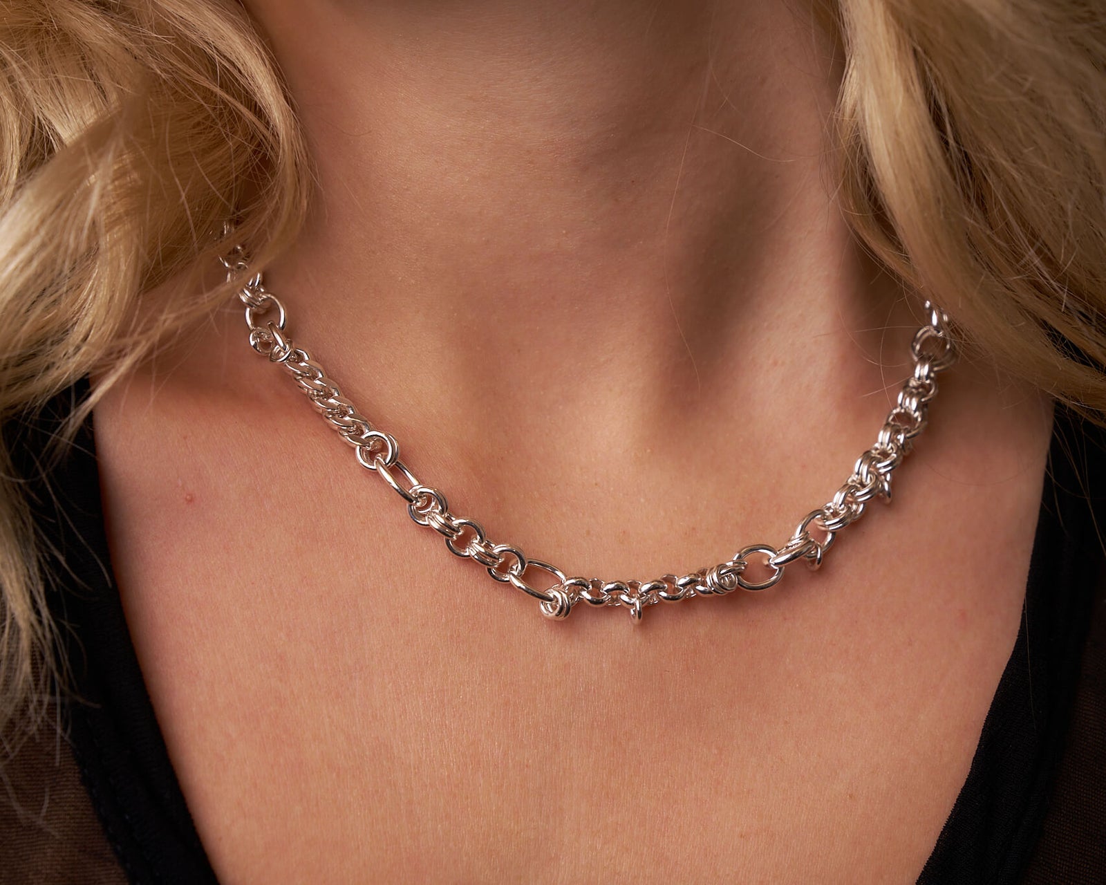 Model wearing the Random Hook Up Lite Necklace in sterling silver