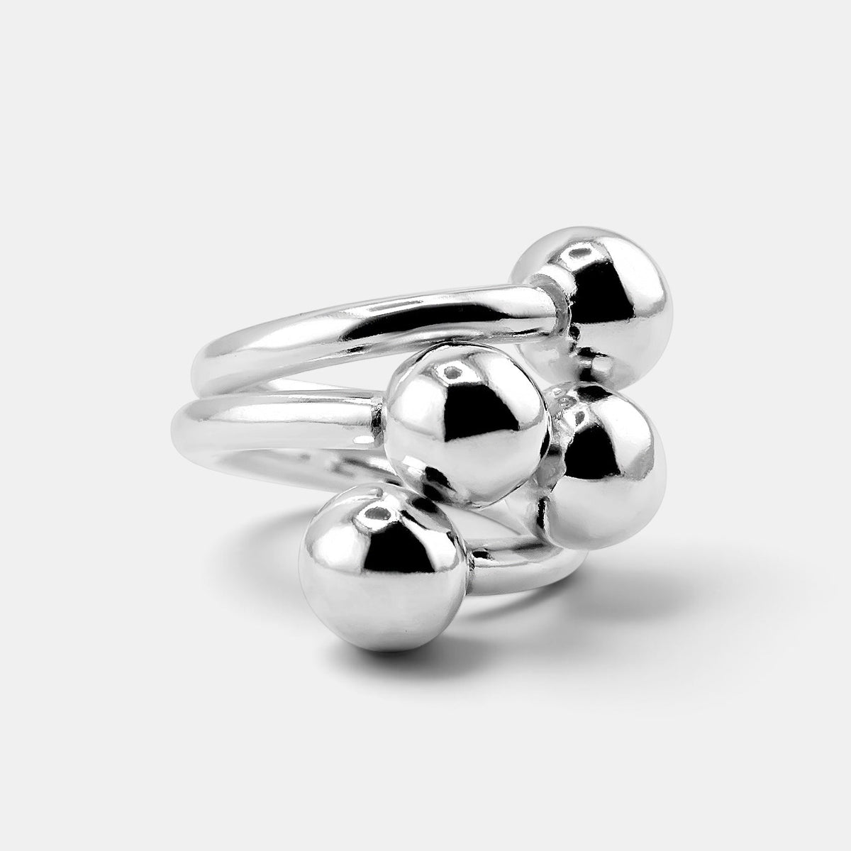 annabel-b 4Balls ring in polished sterling silver featuring four sculptural spheres arranged on a solid band
