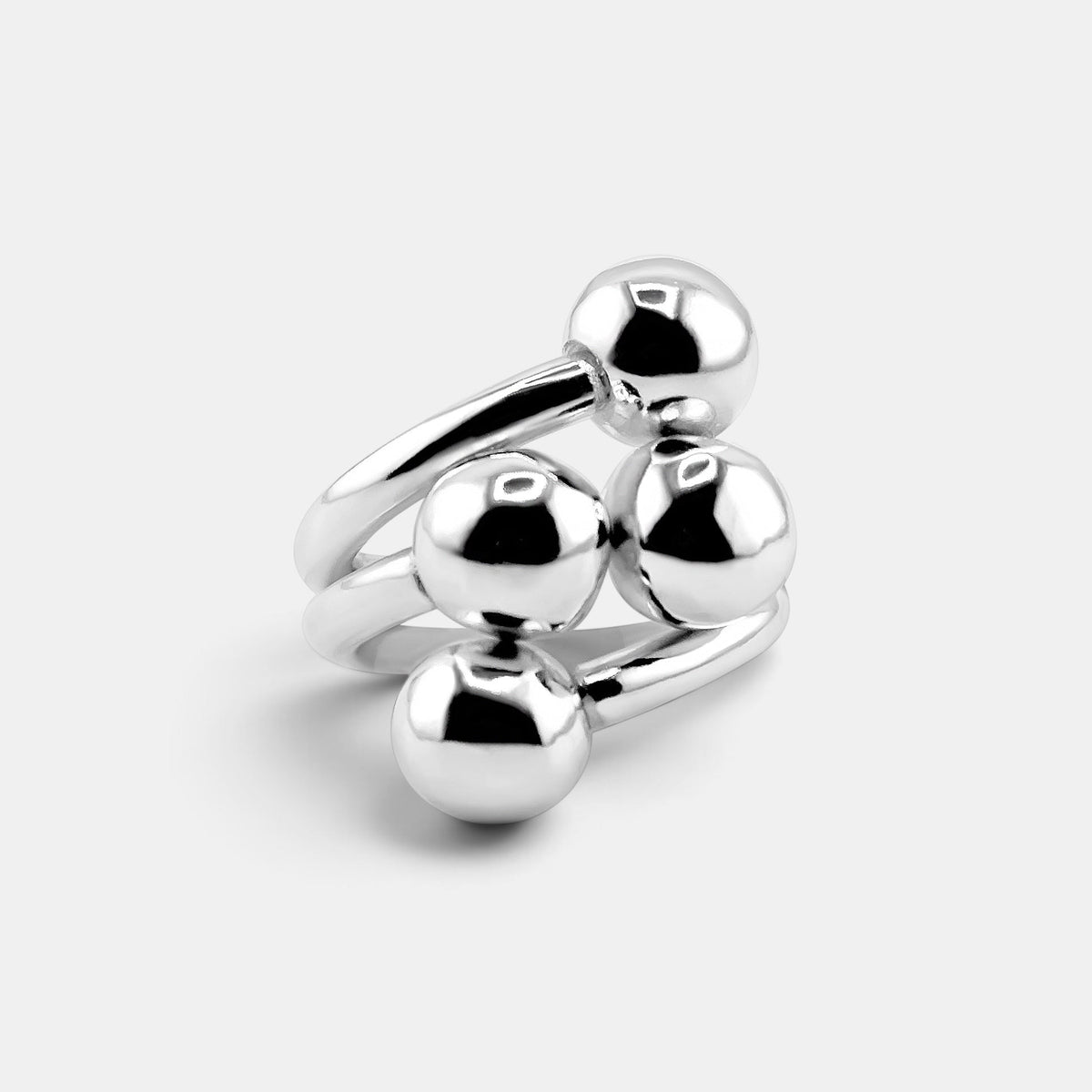 annabel-b 4Balls ring in polished sterling silver featuring four sculptural spheres in a unique stacked design