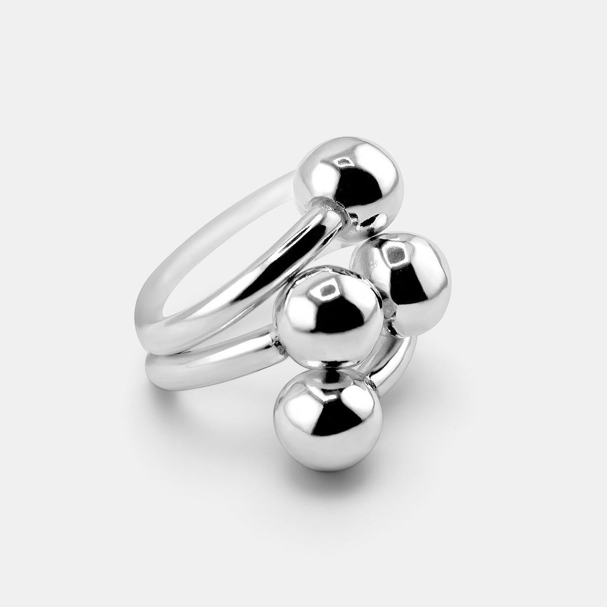 annabel-b 4Balls ring in polished sterling silver featuring four sculptural spheres on a solid band