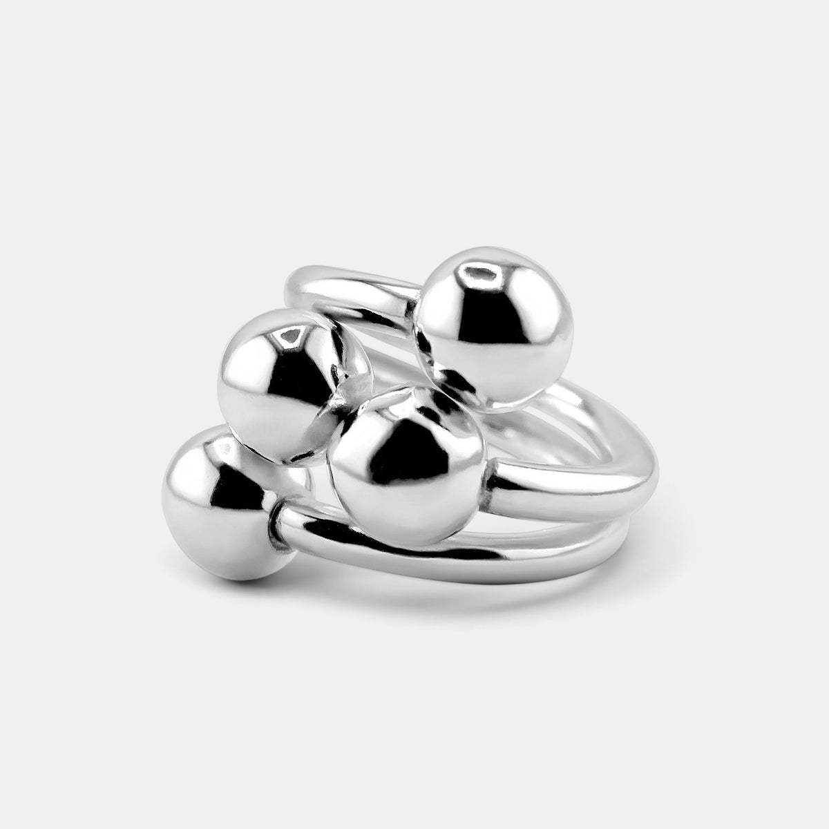 annabel-b 4Balls ring featuring four polished sterling silver spheres in a sculptural, stacked design.
