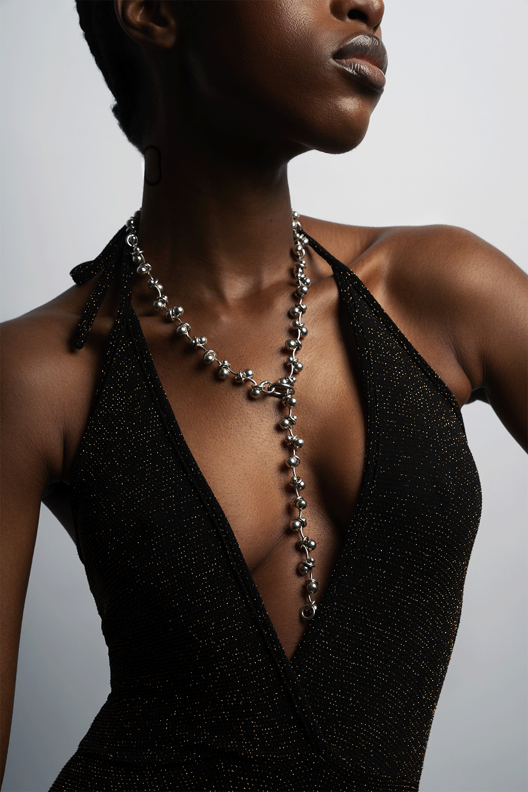 Model wearing the silver BarBell Drop Necklace
