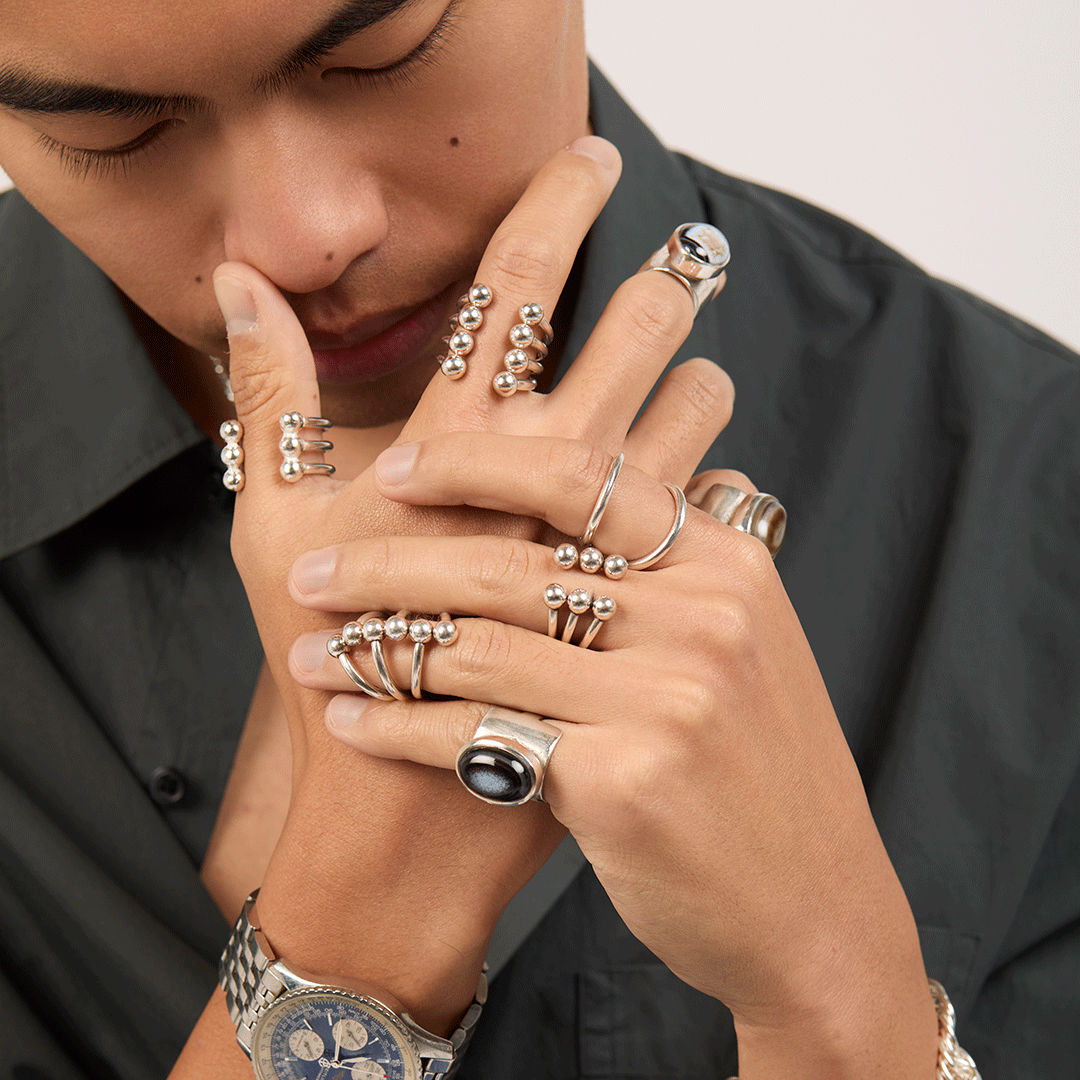 Model wearing Even4 rings