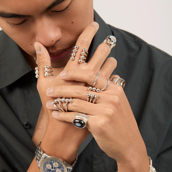 Model wearing Even4 rings